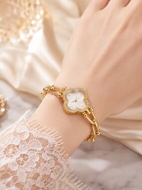 Anthropologie Gold and White Clover Bracelet Watch